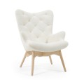 Kody armchair in shearling and solid wood feet